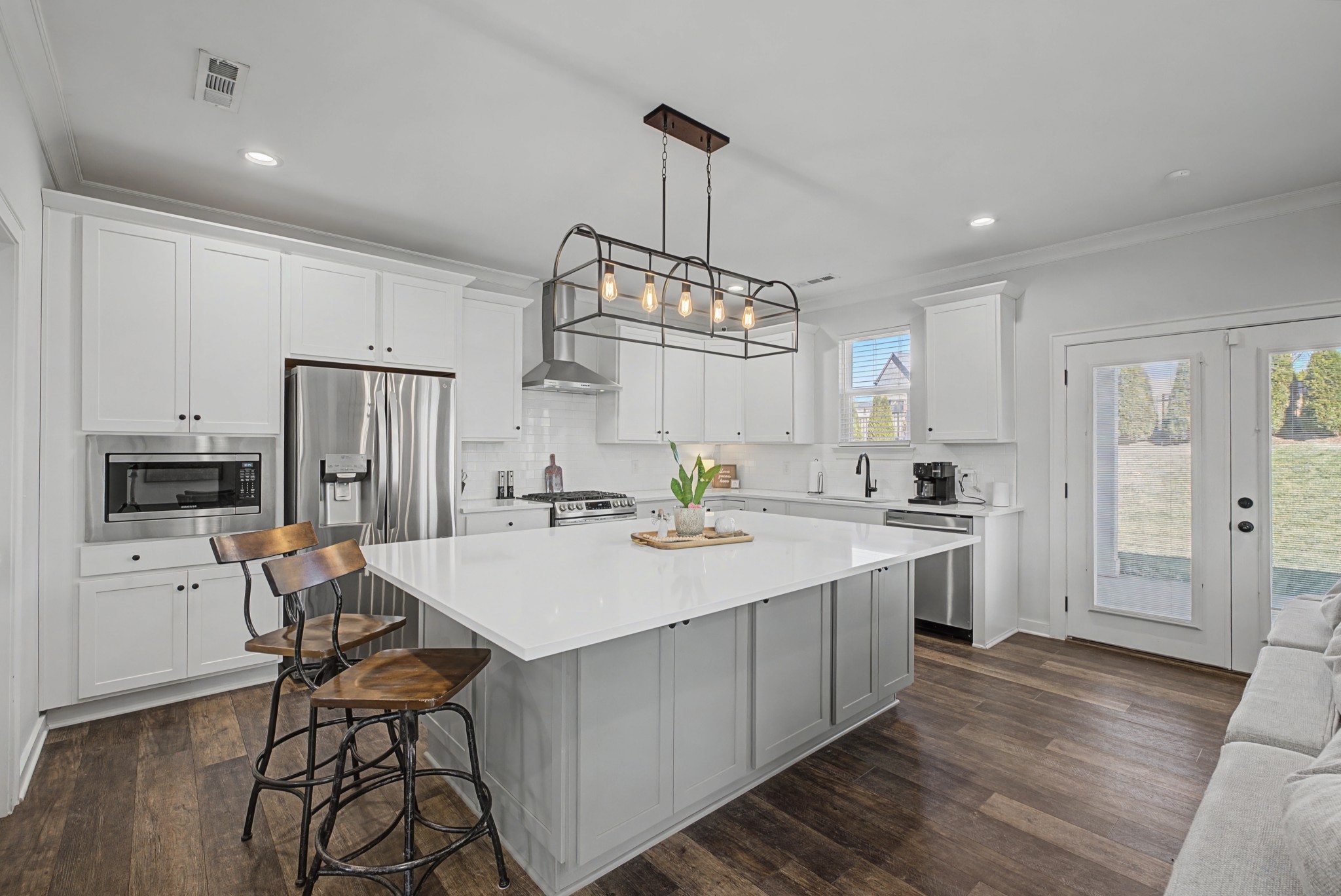 837 Plowson Road Mount Juliet, TN 37122 - Photo 12 of 44 a kitchen with a sink a counter space appliances and cabinets