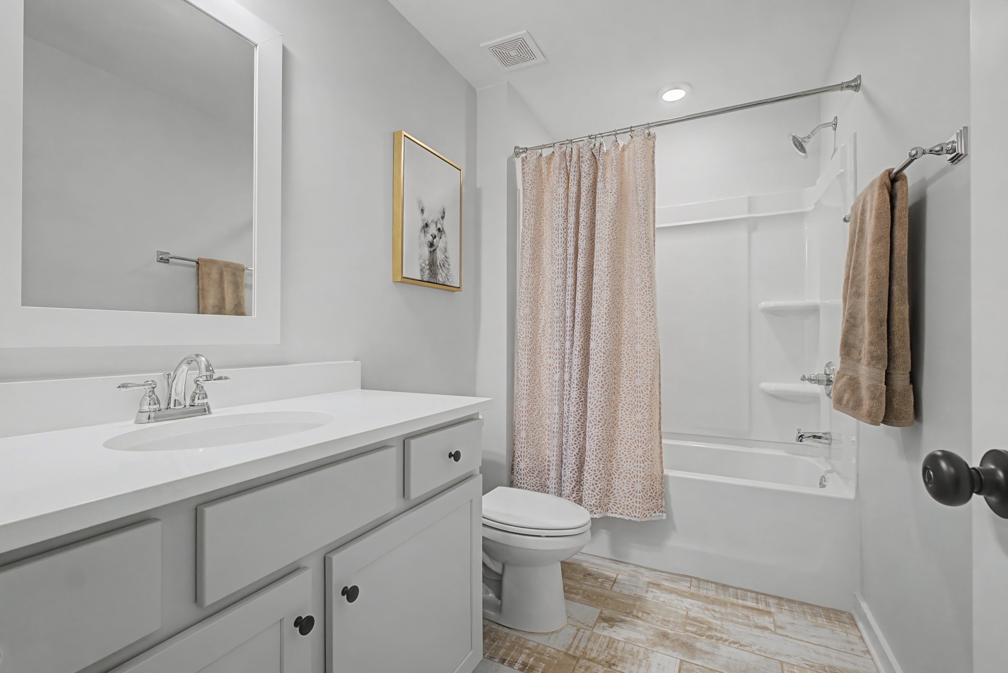 837 Plowson Road Mount Juliet, TN 37122 - Photo 27 of 44 a bathroom with a sink toilet and shower