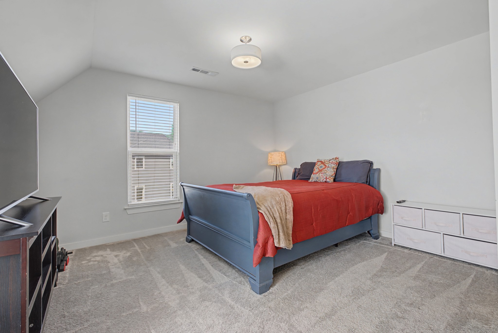 837 Plowson Road Mount Juliet, TN 37122 - Photo 29 of 44 a bedroom with a bed and window