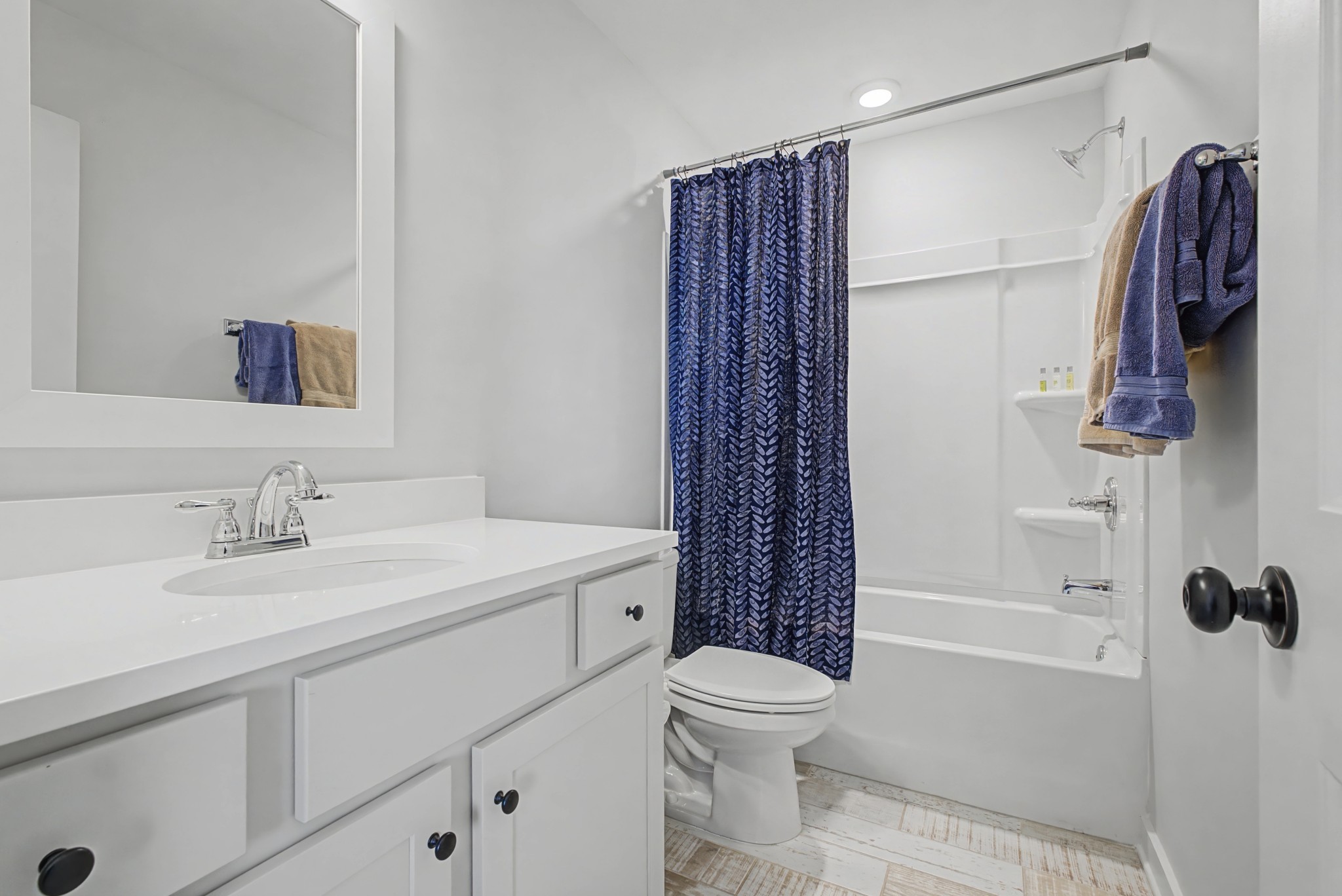 837 Plowson Road Mount Juliet, TN 37122 - Photo 30 of 44 a bathroom with a sink toilet and shower