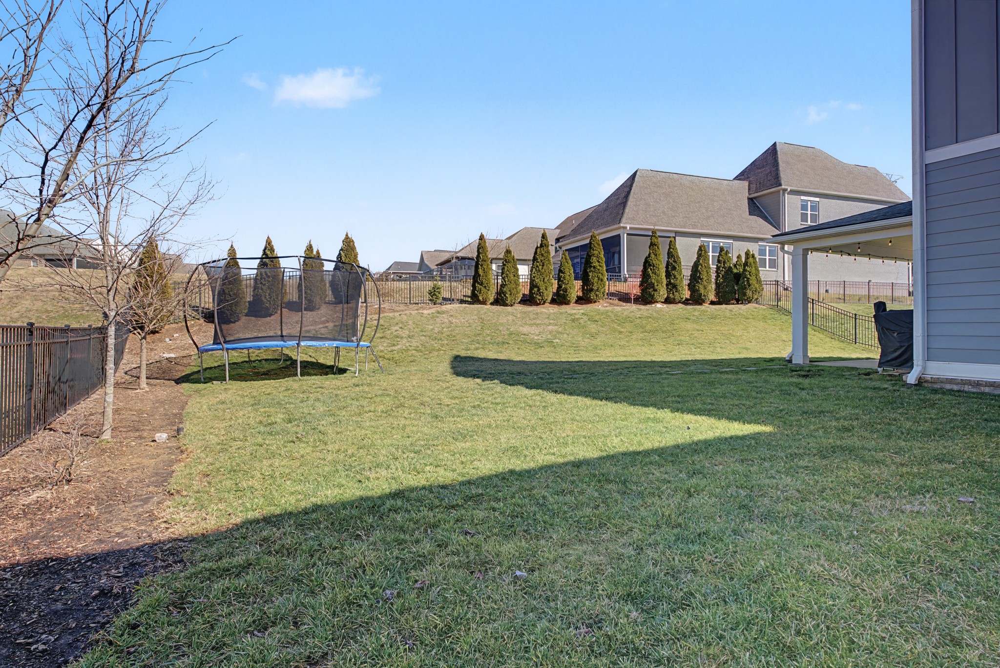 837 Plowson Road Mount Juliet, TN 37122 - Photo 35 of 44 a view of a house with a yard and a garden