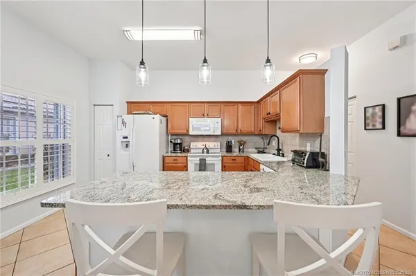 $399,999 | 621 Northwest Broken Oak Trail, Jensen Beach, FL 34957