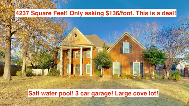 a view of a house with a park