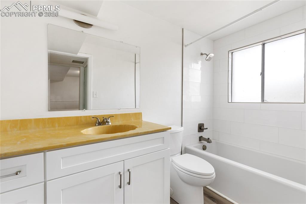 528 Rowe Lane Colorado Springs, CO 80911 - Photo 27 of 38 a bathroom with a sink a toilet and a bathtub