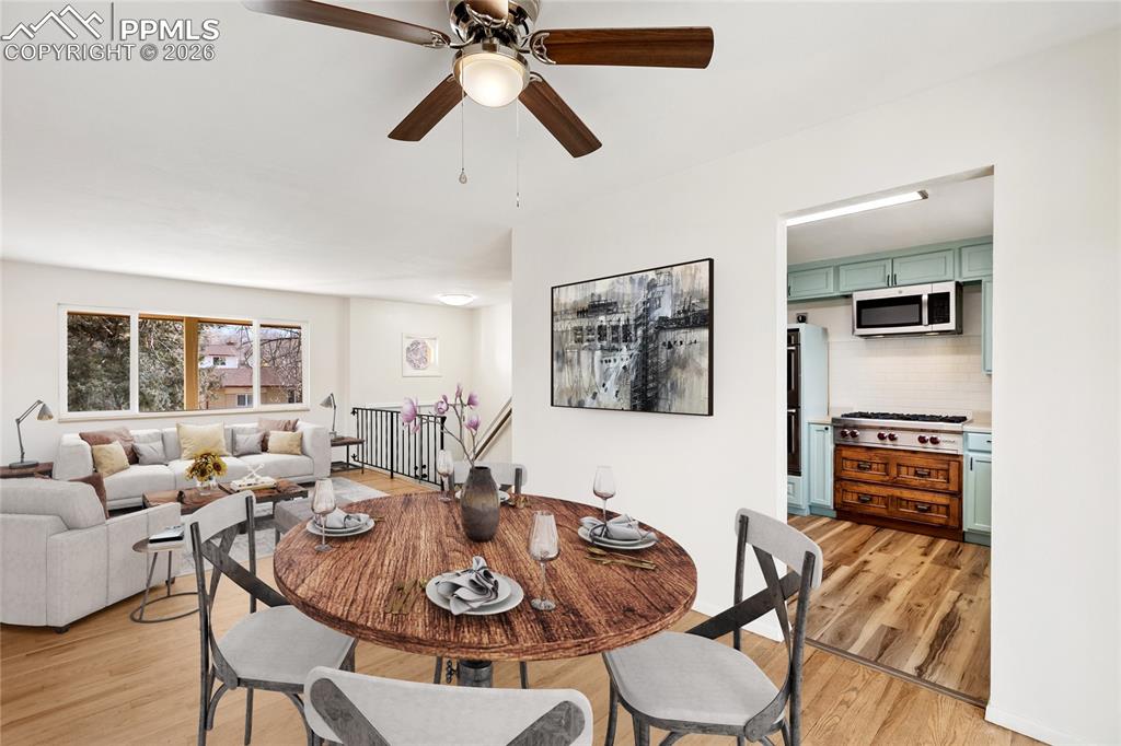 528 Rowe Lane Colorado Springs, CO 80911 - Photo 3 of 38 a living room with furniture and a table