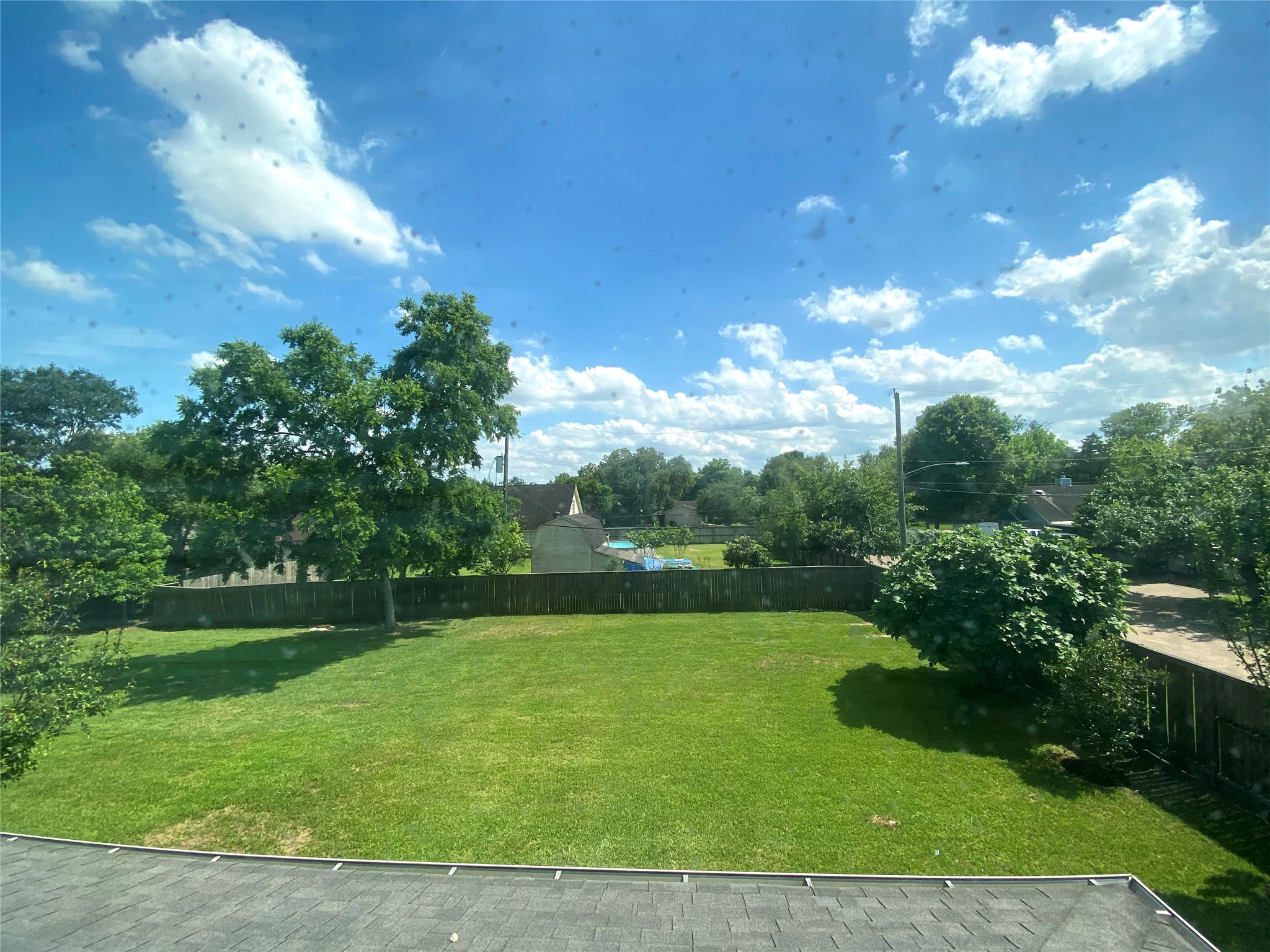 12122 Ross Road Houston, TX 77034 - Photo 5 of 16 Backyard view from upstairs Bedroom window