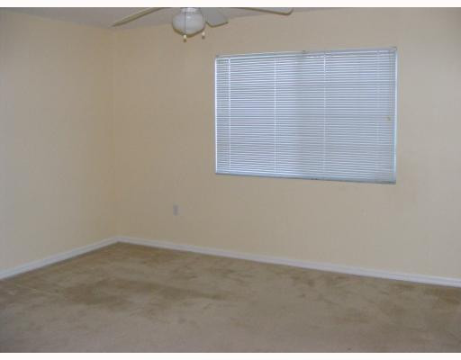 5025 Wiles Road, Unit 101 Pompano Beach, FL 33073 - Photo 3 of 8 Master Bedroom