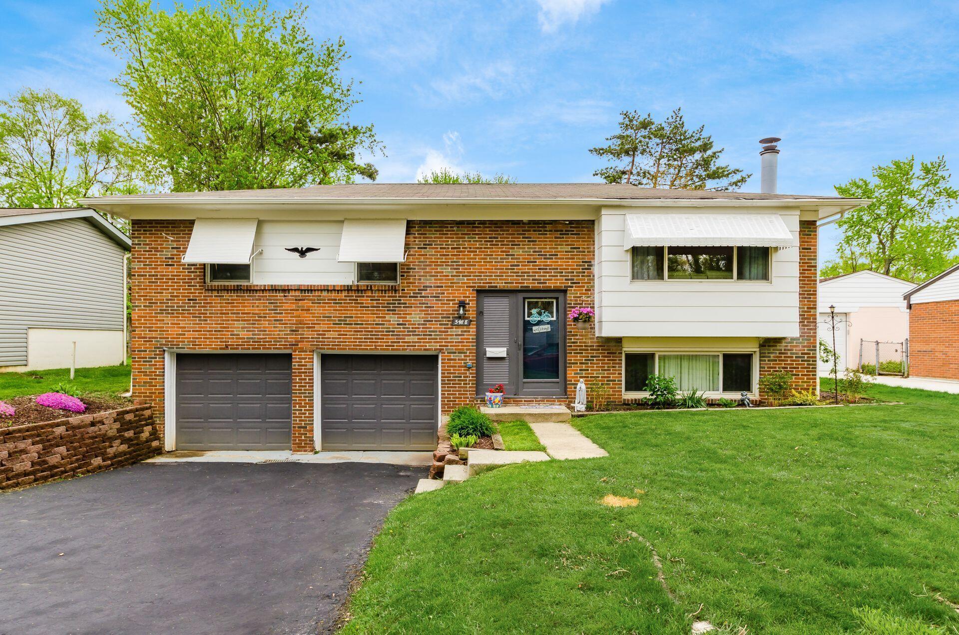 5488 Darcy Road Columbus, OH 43229 - Photo 1 of 48 Brick bi-level in Salem Village