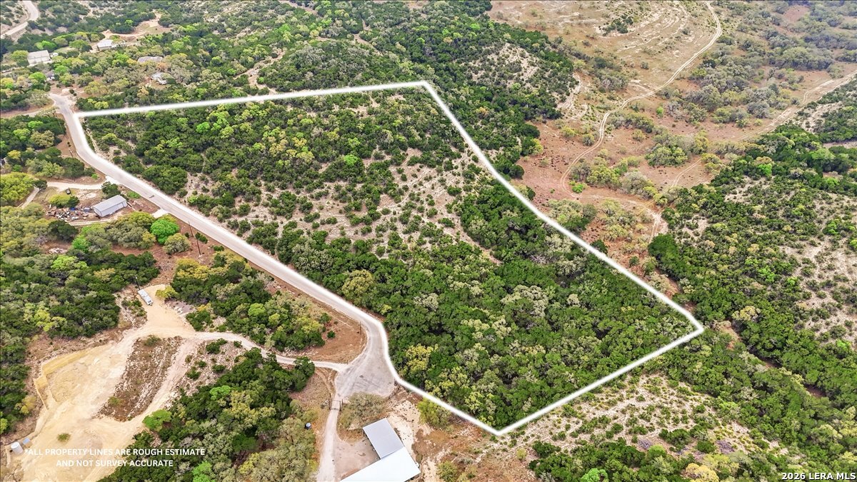 105-109 West Winding Loop Boerne, TX 78006 - Photo 12 of 34 a view of swimming pool with a garden from a balcony