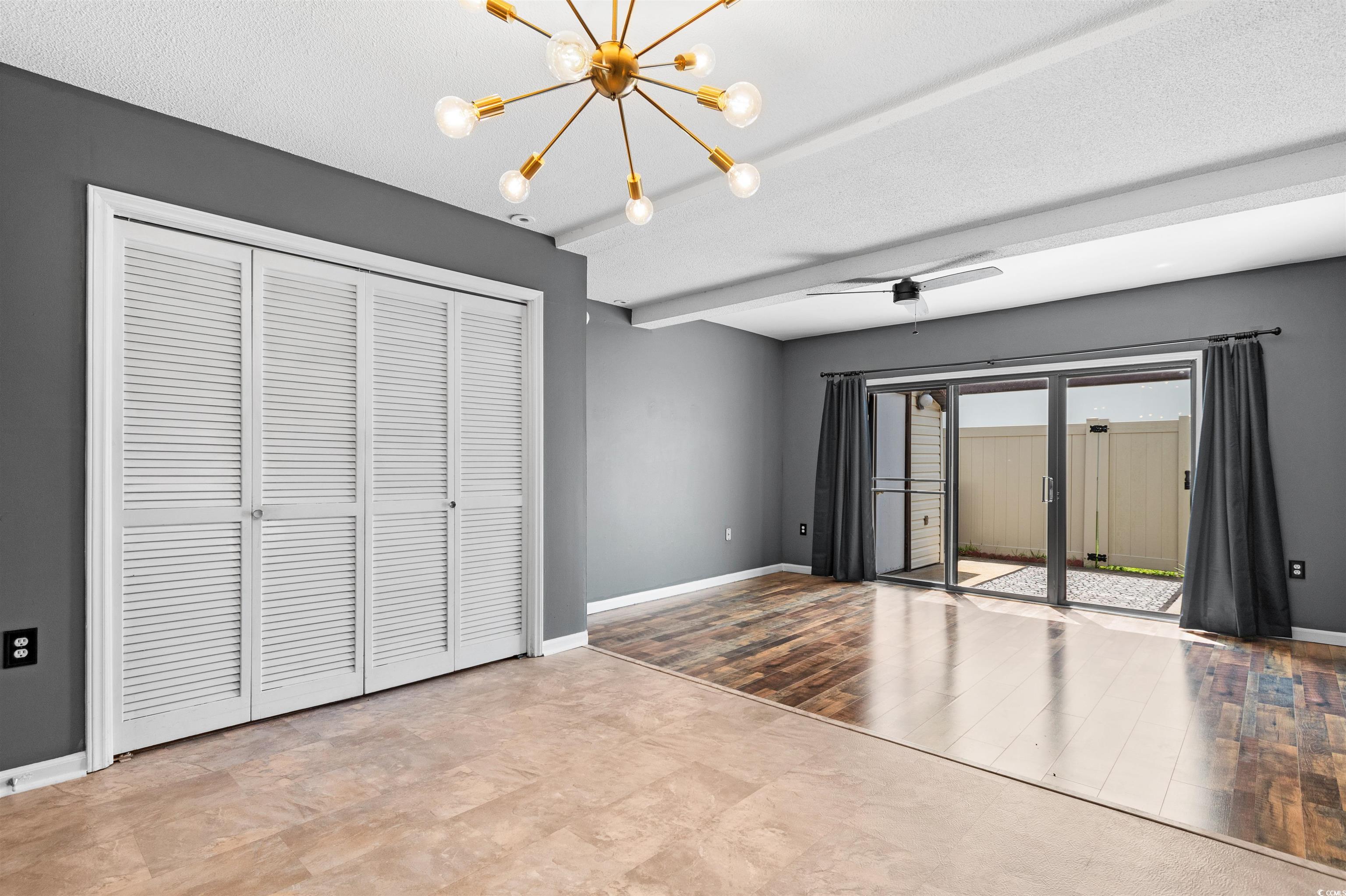 Spare room featuring a textured ceiling, a notable