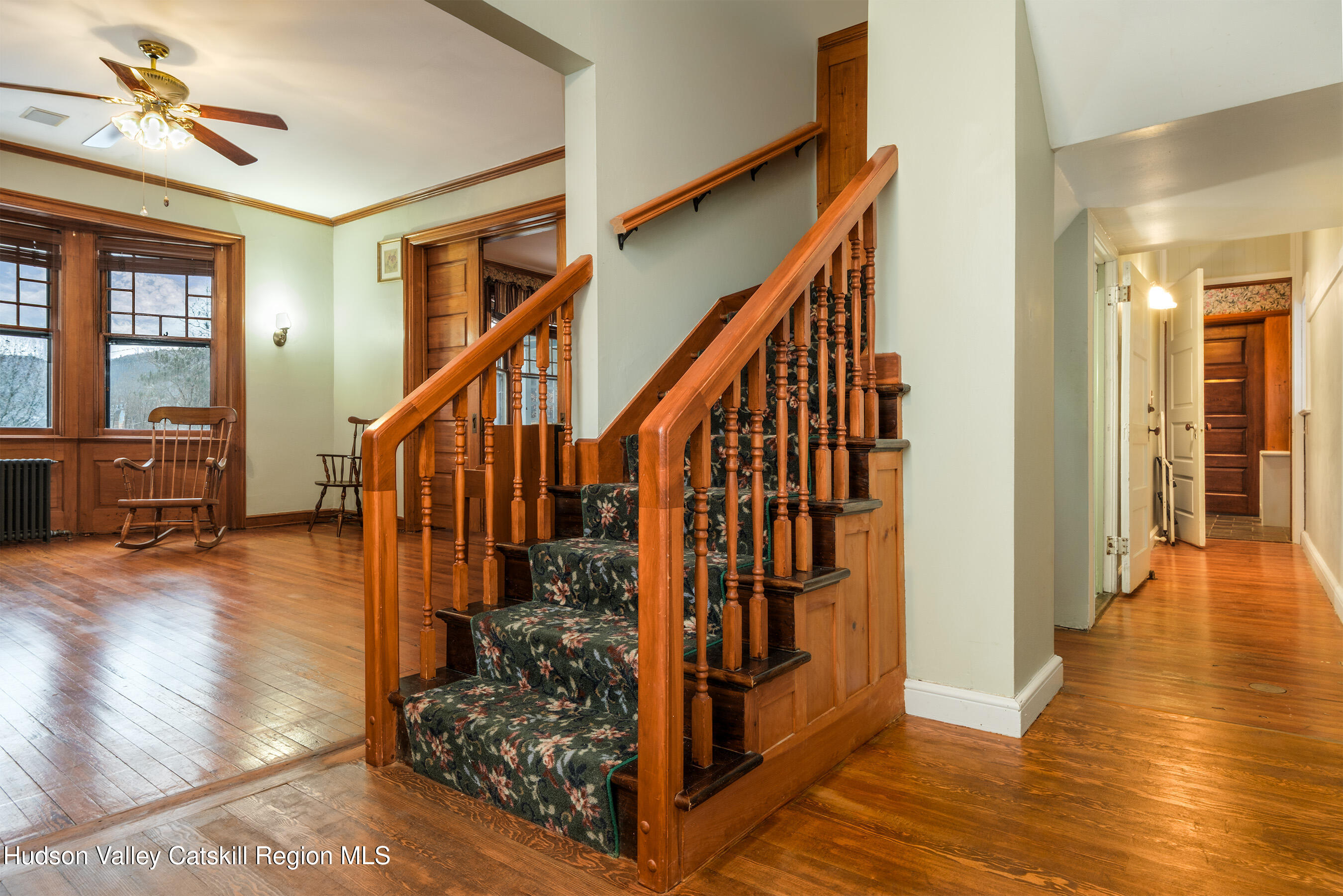 6 Westridge Road Cooperstown, NY 13326 - Photo 60 of 119 a view of a hallway with wooden floor and staircase