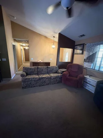a spacious bathroom with a double vanity sink a mirror and a bathtub