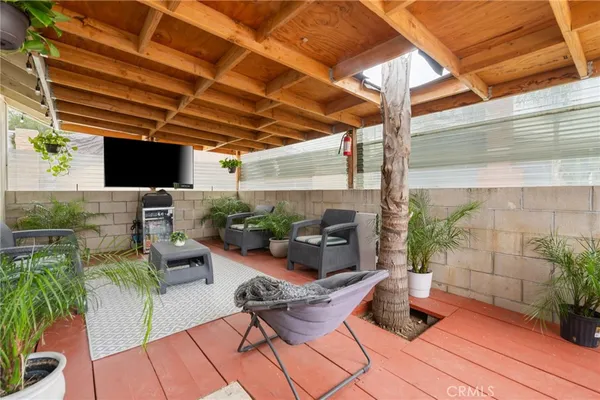 a outdoor space with patio the couches and a potted plant