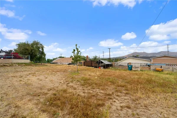 a view of a yard with an outdoor space