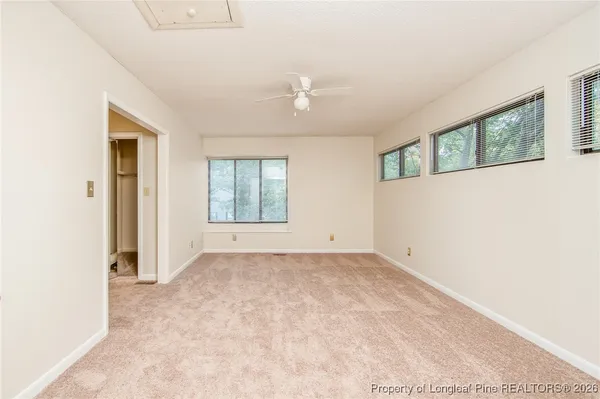an empty room with windows