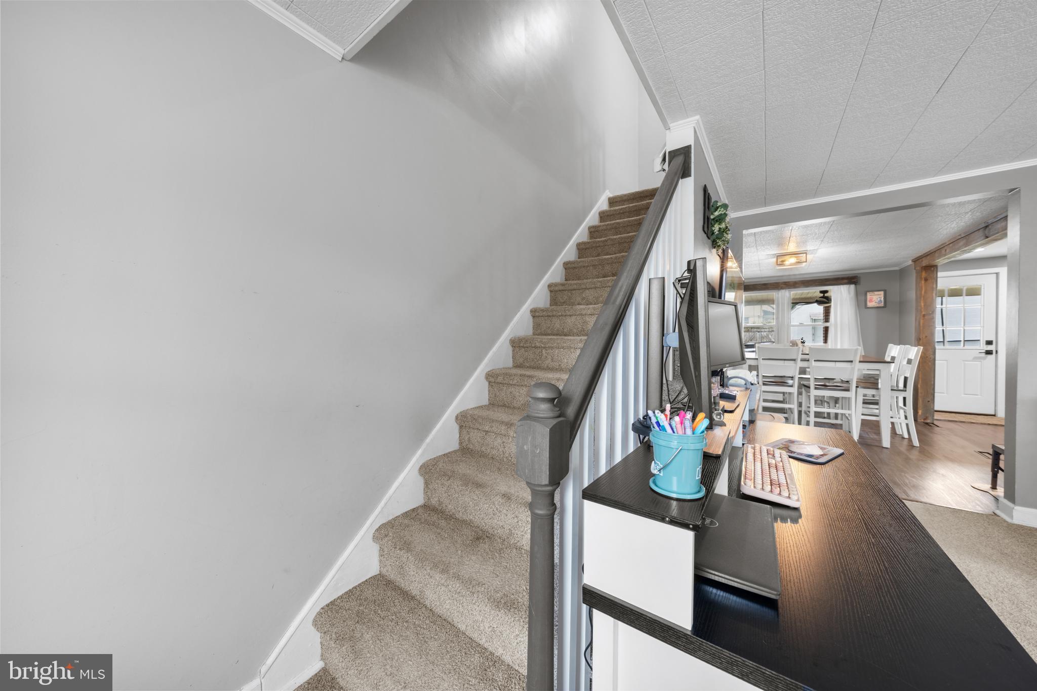240 5th Street Whitehall, PA 18052 - Photo 13 of 43 a view of a living room with furniture and wooden floor