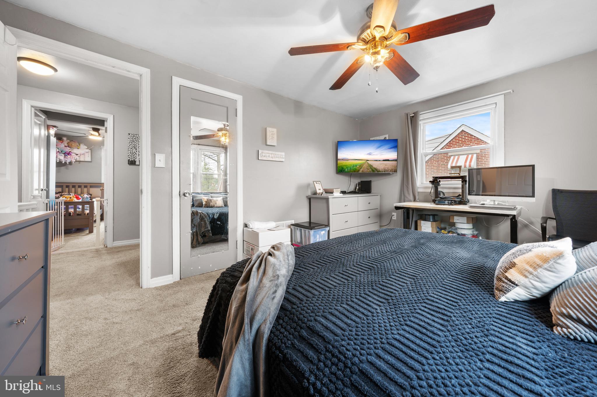 240 5th Street Whitehall, PA 18052 - Photo 16 of 43 a bedroom with furniture and a chandelier