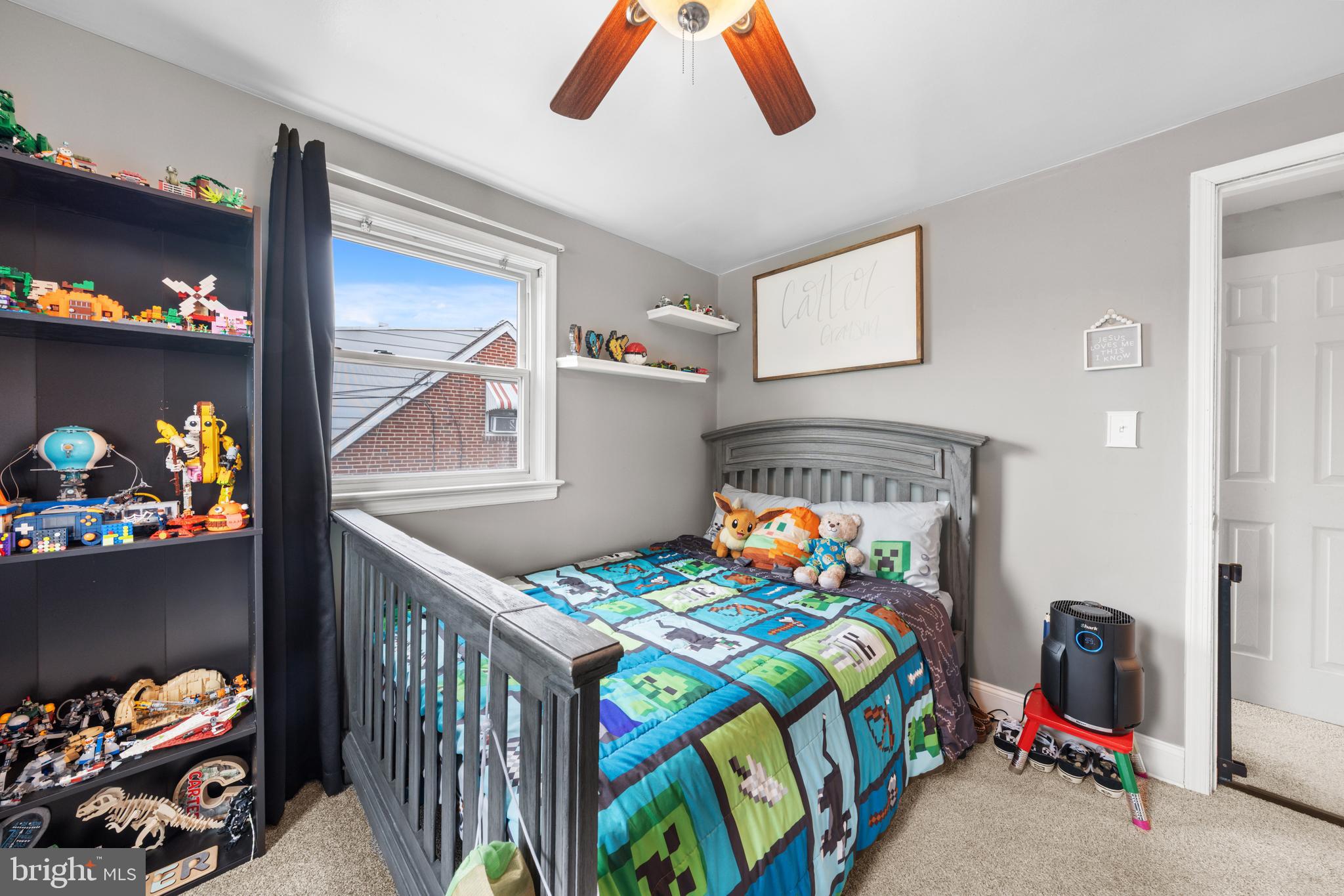 240 5th Street Whitehall, PA 18052 - Photo 18 of 43 a bedroom with a bed and a baby crib