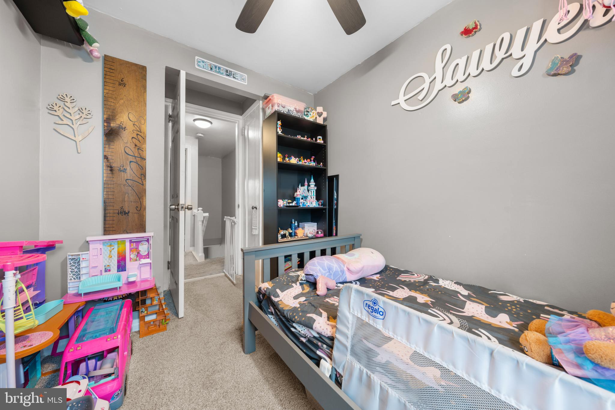 240 5th Street Whitehall, PA 18052 - Photo 20 of 43 a bedroom with a bed and a chandelier