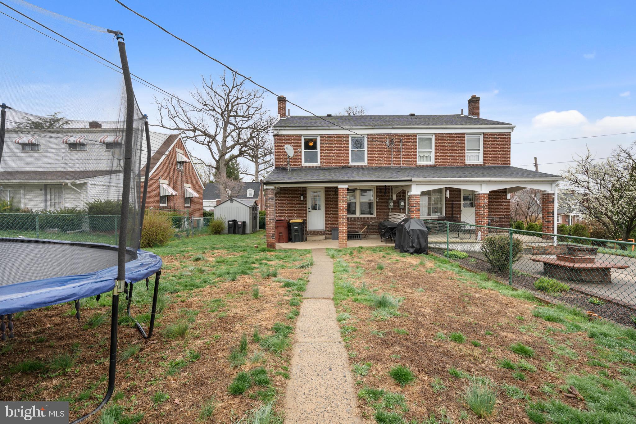 240 5th Street Whitehall, PA 18052 - Photo 28 of 43 a front view of a house with a yard table and chairs