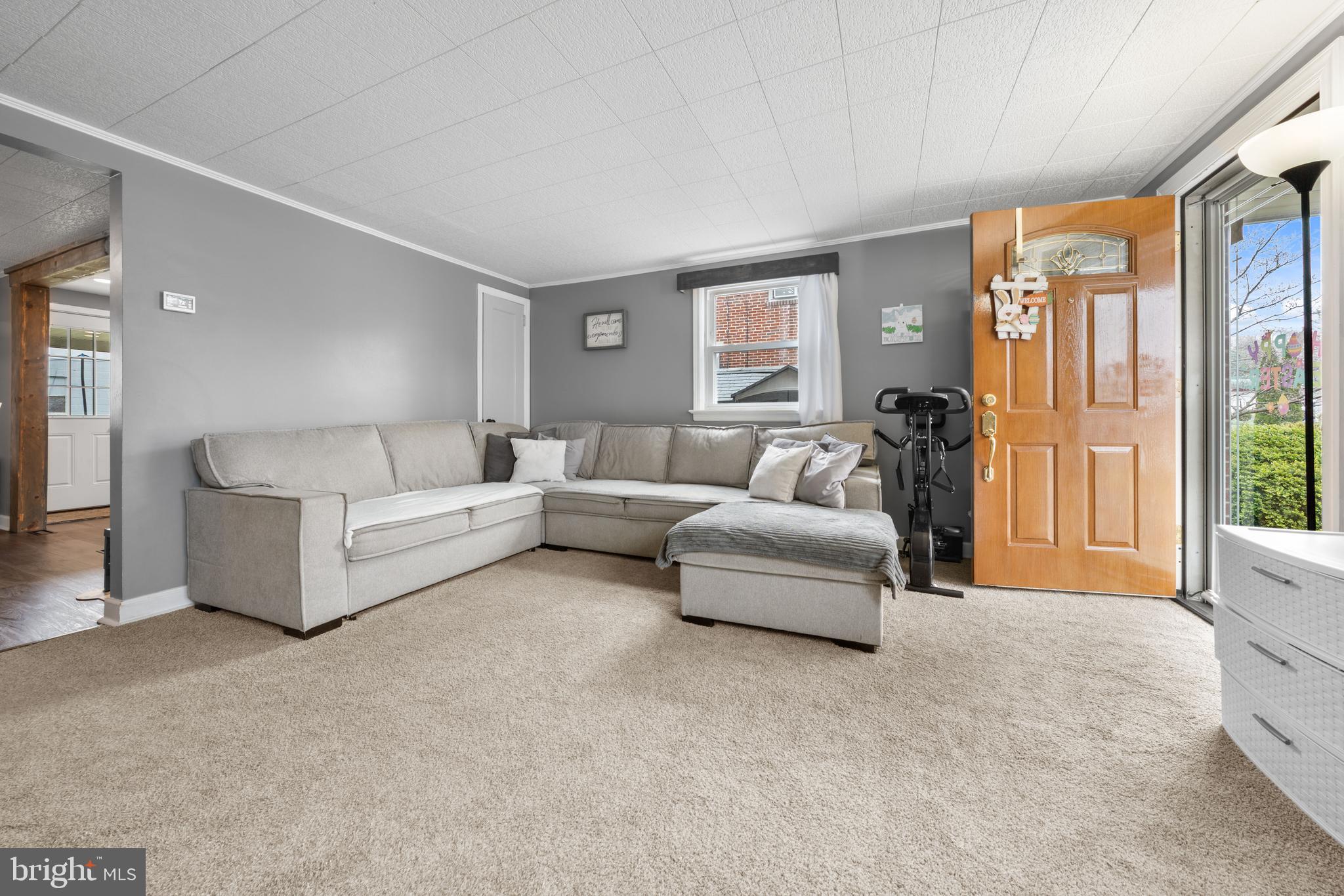 240 5th Street Whitehall, PA 18052 - Photo 3 of 43 a living room with furniture and a large window