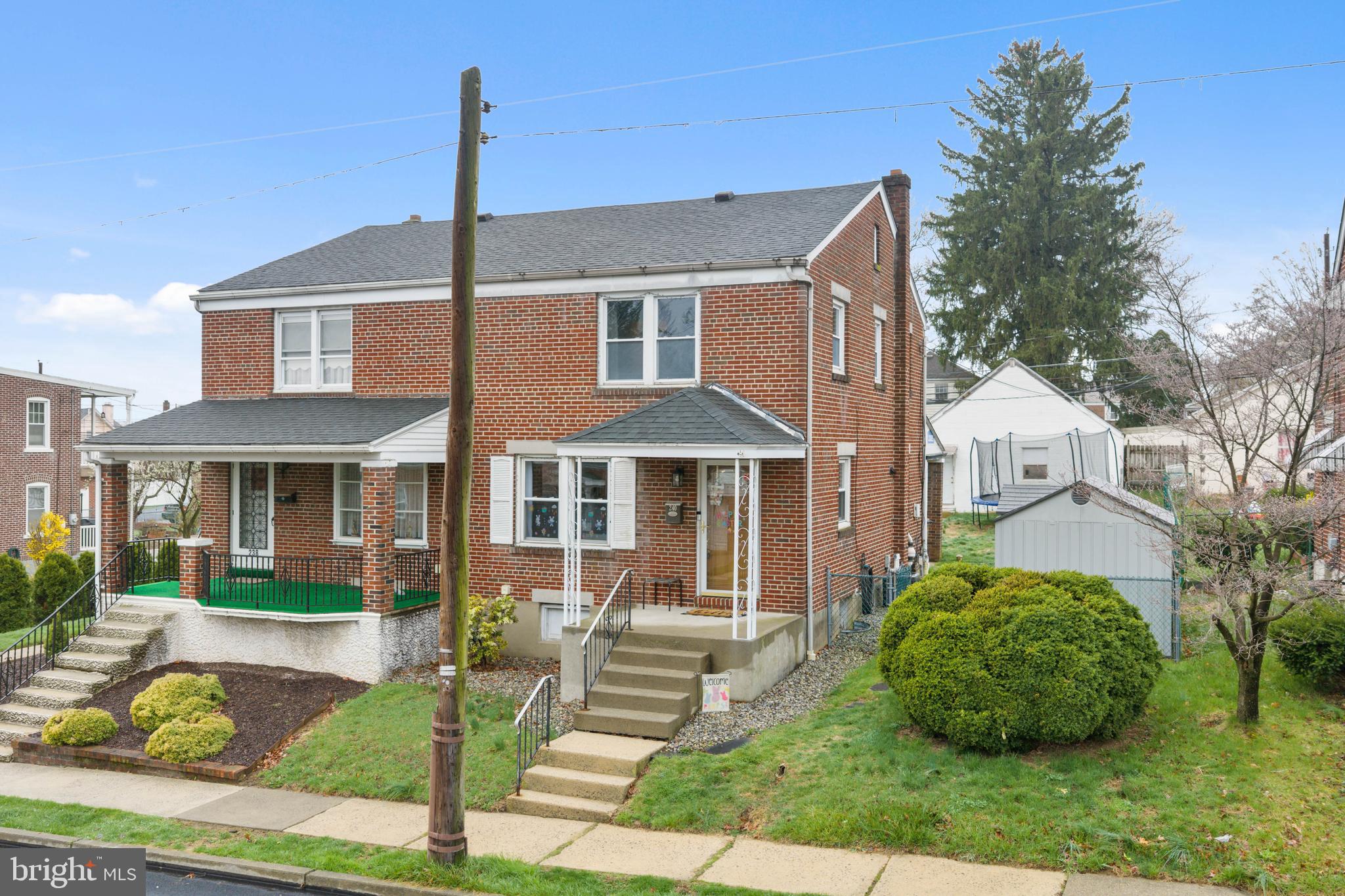 240 5th Street Whitehall, PA 18052 - Photo 35 of 43 a front view of a house with garden