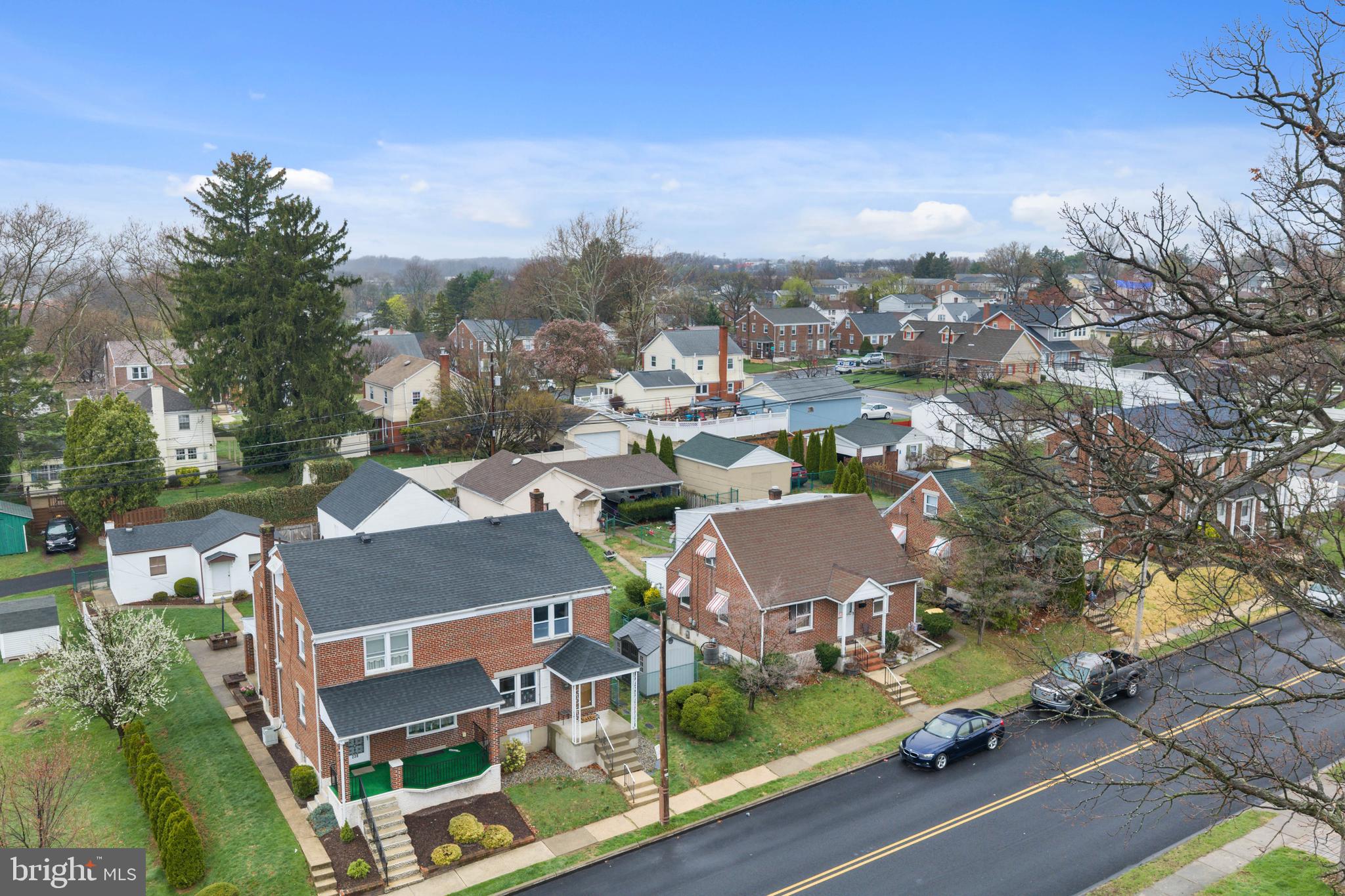 240 5th Street Whitehall, PA 18052 - Photo 37 of 43 an aerial view of residential houses with outdoor space and trees