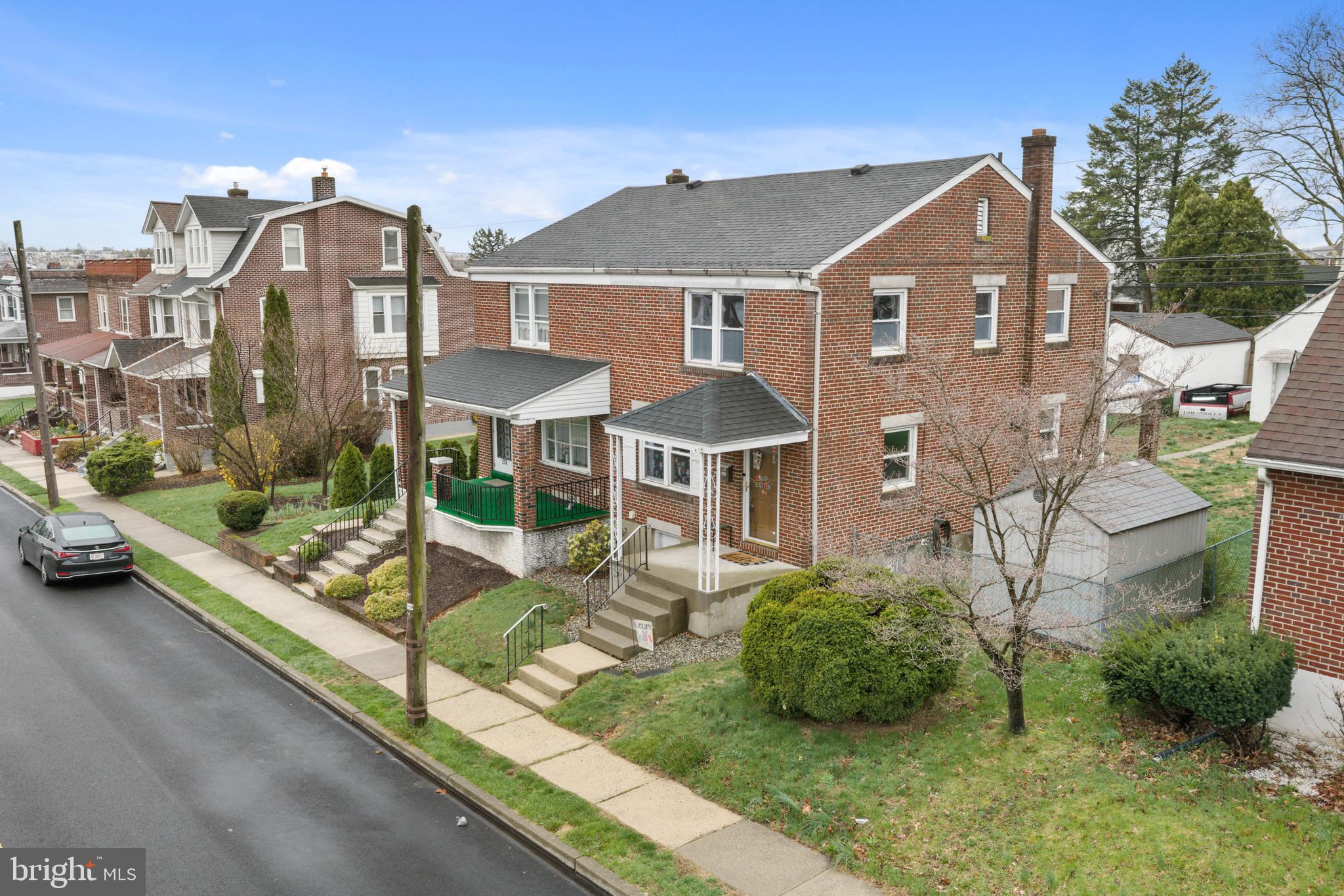 240 5th Street Whitehall, PA 18052 - Photo 39 of 43 a front view of a house with garden