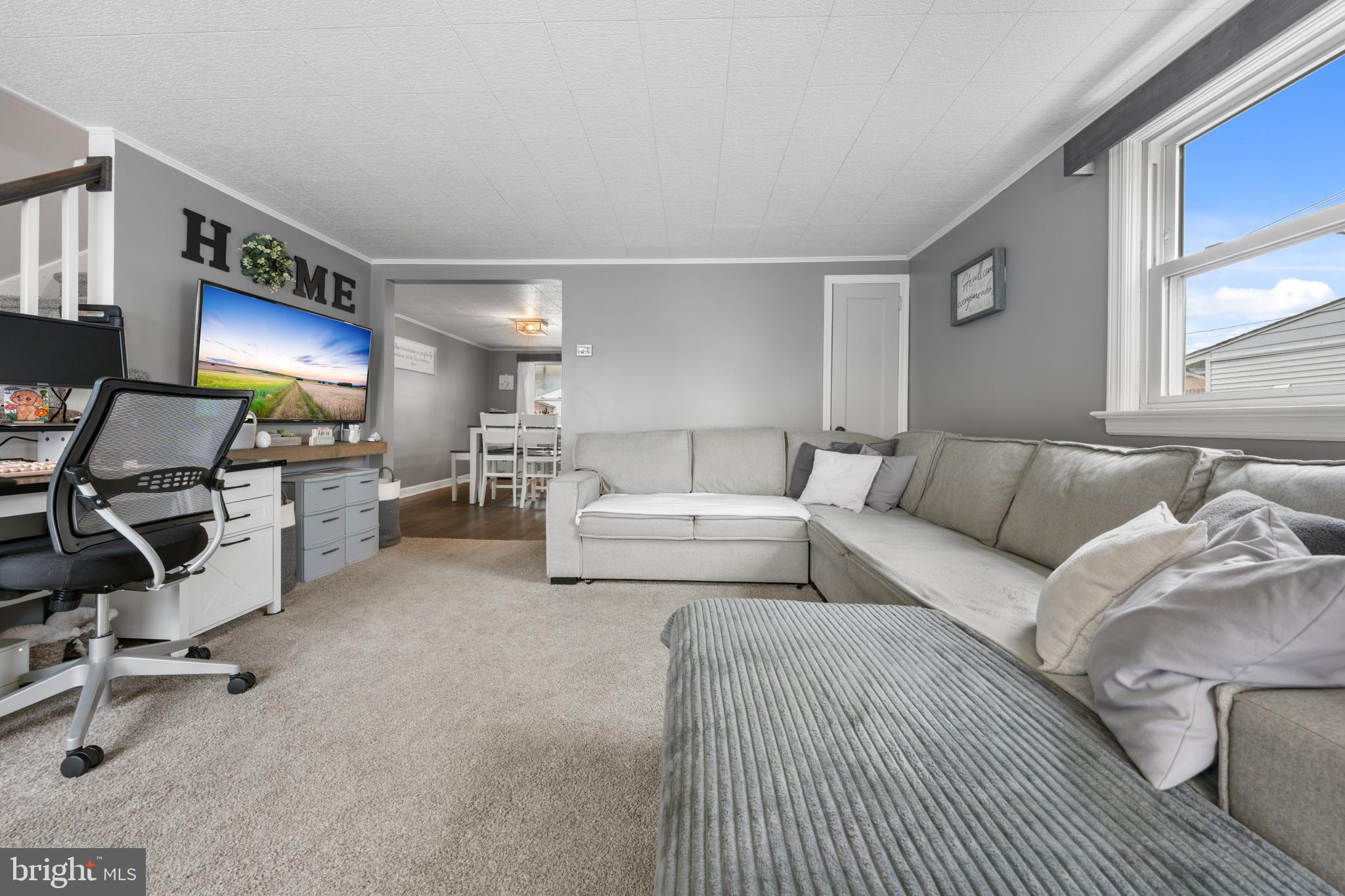 240 5th Street Whitehall, PA 18052 - Photo 4 of 43 a living room with furniture and a flat screen tv