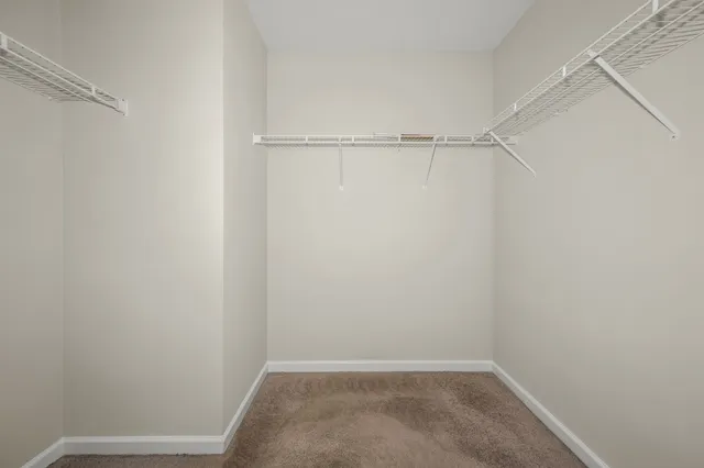 a view of an empty walk in closet