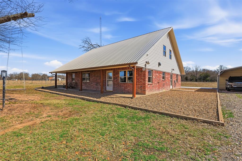 Front of two-story brick home