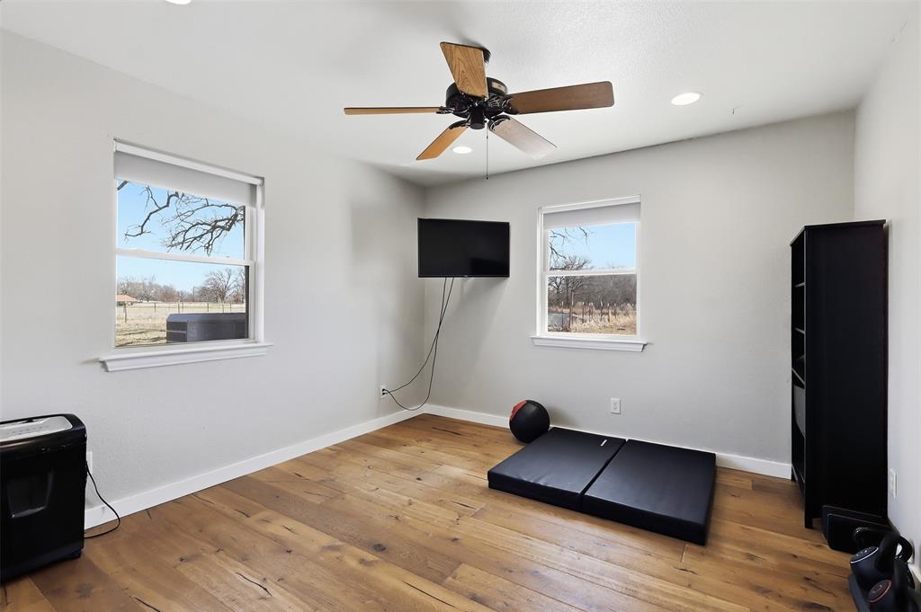 397 Rs County Road 4452 Point, TX 75472 - Photo 18 of 34 a living room with furniture and a flat screen tv