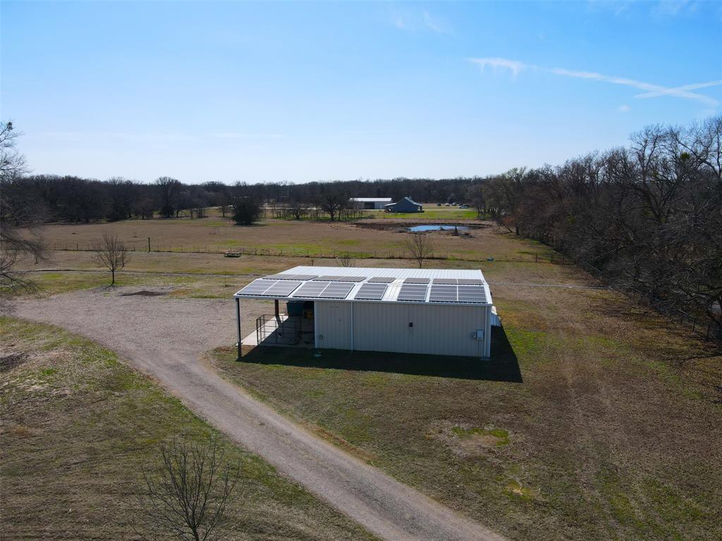 397 Rs County Road 4452 Point, TX 75472 - Photo 23 of 34 a view of a lake with houses in the background