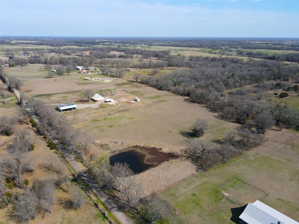 397 Rs County Road 4452 Point, TX 75472 - Photo 28 of 34 an aerial view of residential houses with outdoor space