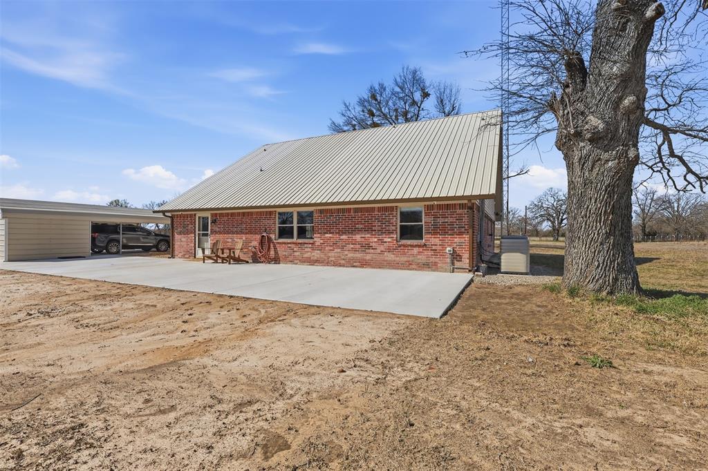 397 Rs County Road 4452 Point, TX 75472 - Photo 4 of 34 a view of a house with a yard