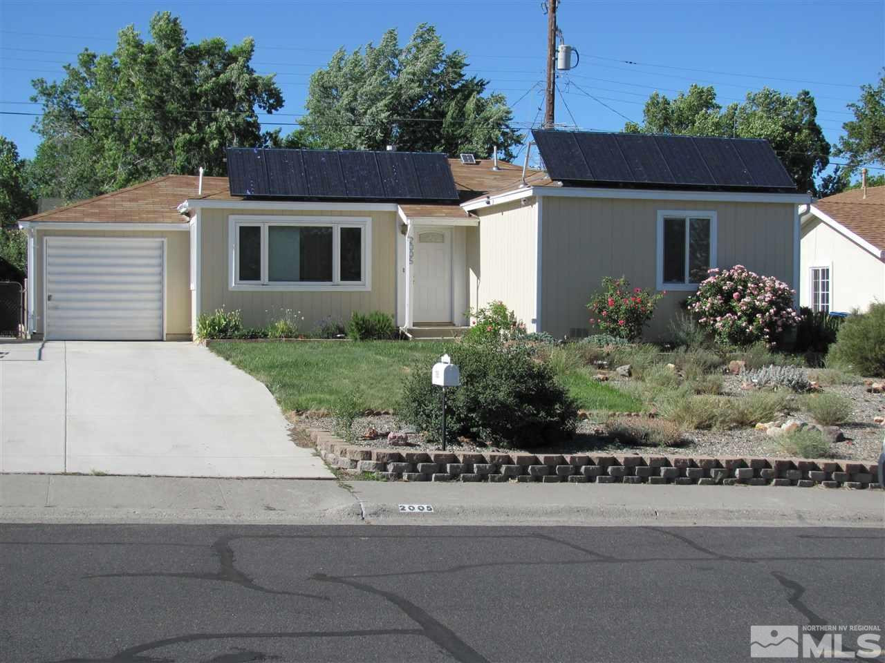 2005 Ellendale Road Reno, NV 89503 - Photo 1 of 1 a view of a house with a yard and potted plants