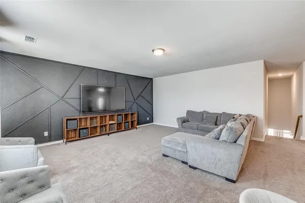 a living room with furniture and a couch