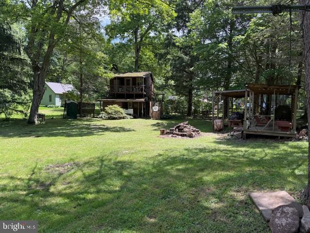 270 Pharr Road Everett, PA 15537 - Photo 11 of 40 a view of a house with backyard porch and sitting area