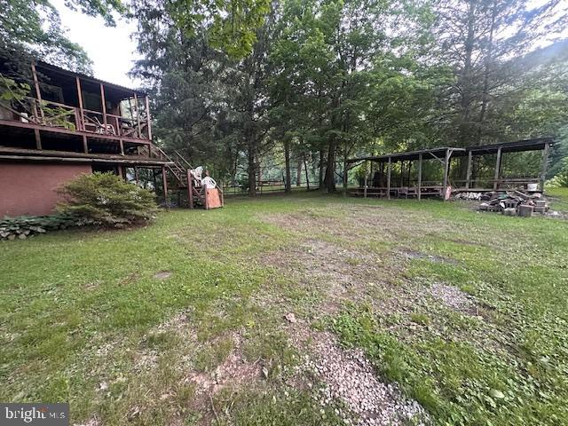 270 Pharr Road Everett, PA 15537 - Photo 22 of 40 a view of a house with backyard and sitting area
