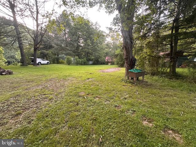 270 Pharr Road Everett, PA 15537 - Photo 24 of 40 a view of outdoor space with deck and trees