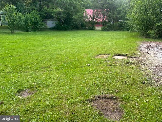 270 Pharr Road Everett, PA 15537 - Photo 26 of 40 a backyard of a house with lots of green space and fountain