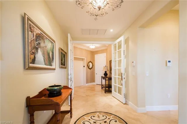 a bedroom with furniture and window