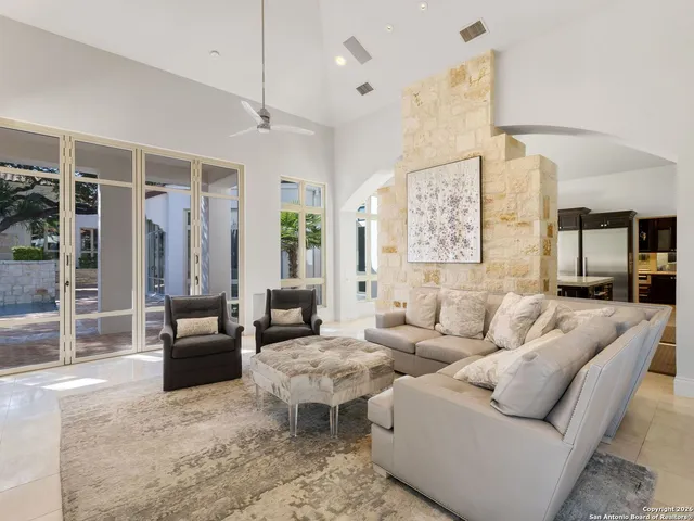 a view of a livingroom with a fireplace and a flat screen tv