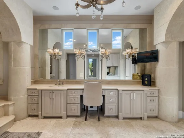 a kitchen with stainless steel appliances granite countertop a stove and a sink