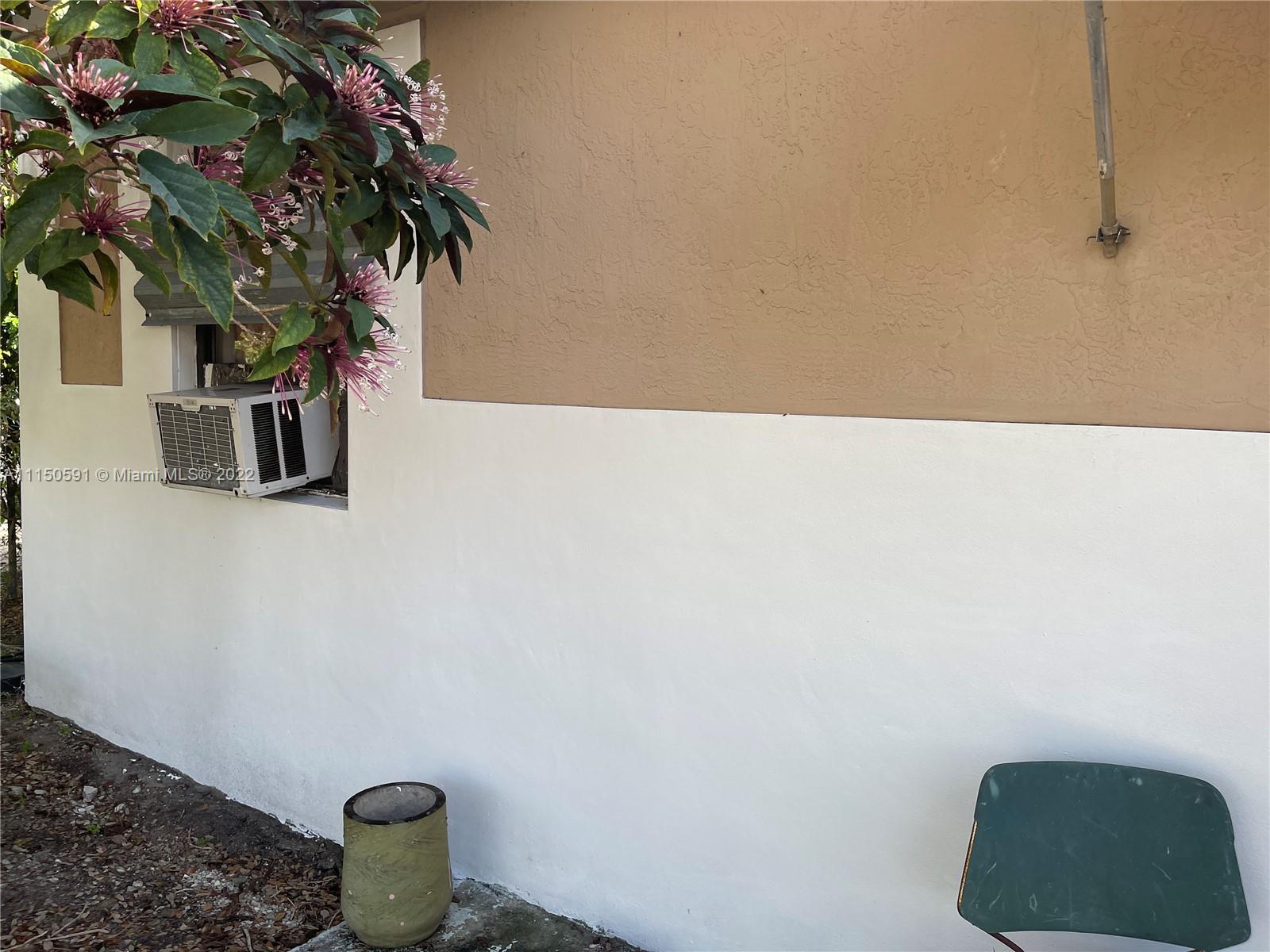 420 Northwest 96th Street Miami, FL 33150 - Photo 2 of 3 a bathroom with a toilet