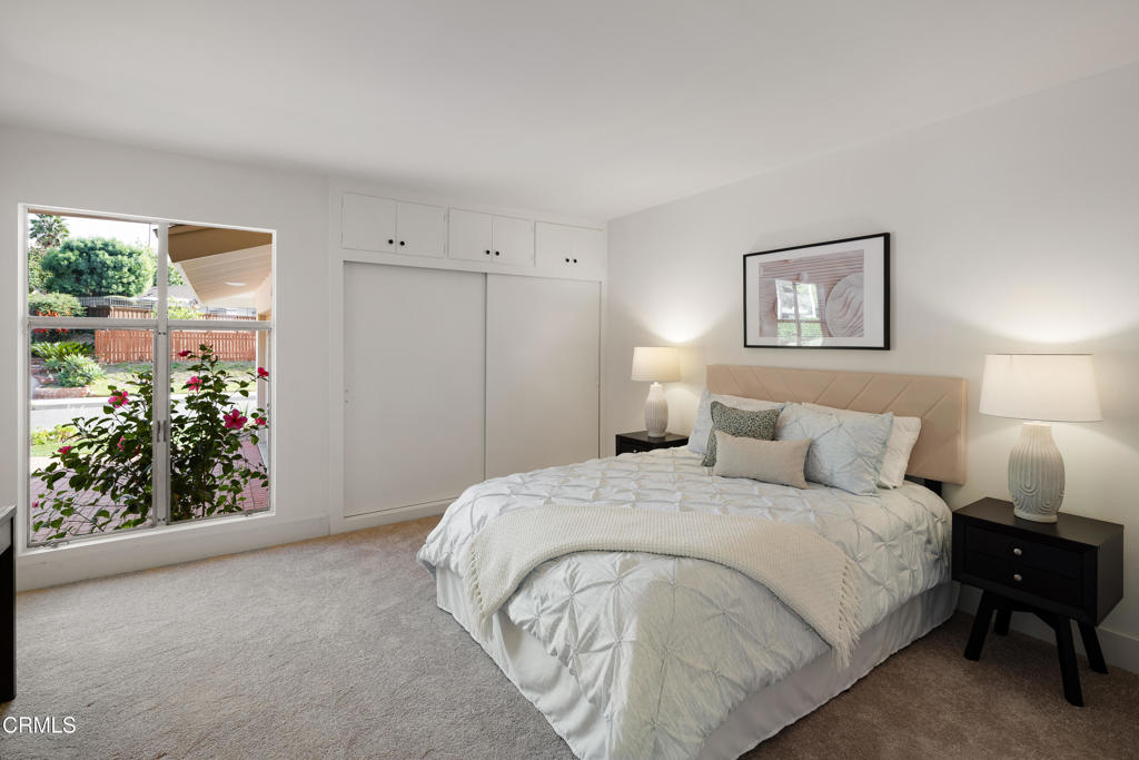 3514 St Elizabeth Road Glendale, CA 91206 - Photo 20 of 75 a bedroom with a bed and a painting on the wall