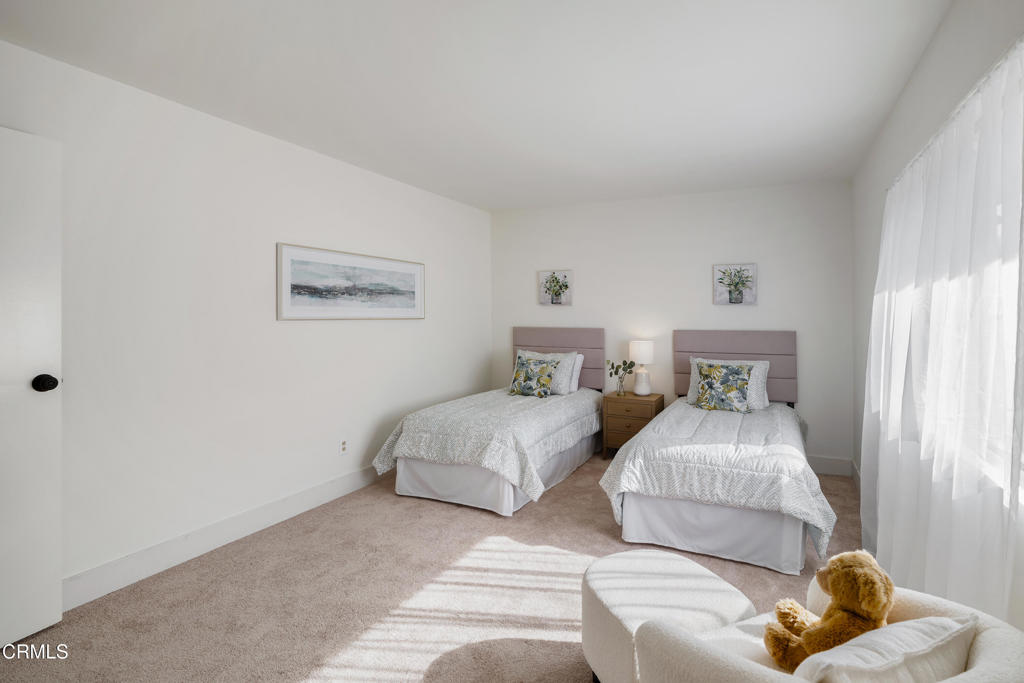 3514 St Elizabeth Road Glendale, CA 91206 - Photo 25 of 75 a bedroom with two beds and painting on the wall
