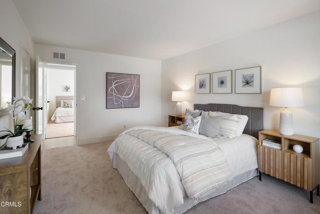 3514 St Elizabeth Road Glendale, CA 91206 - Photo 26 of 75 a bedroom with a bed and wooden floor
