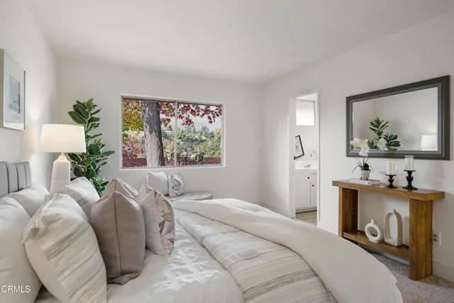 a view of a backyard with sitting area