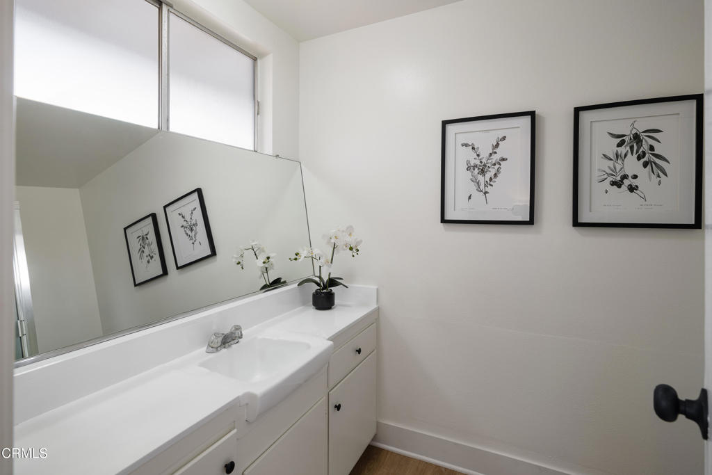 3514 St Elizabeth Road Glendale, CA 91206 - Photo 30 of 75 a bathroom with a sink and a mirror